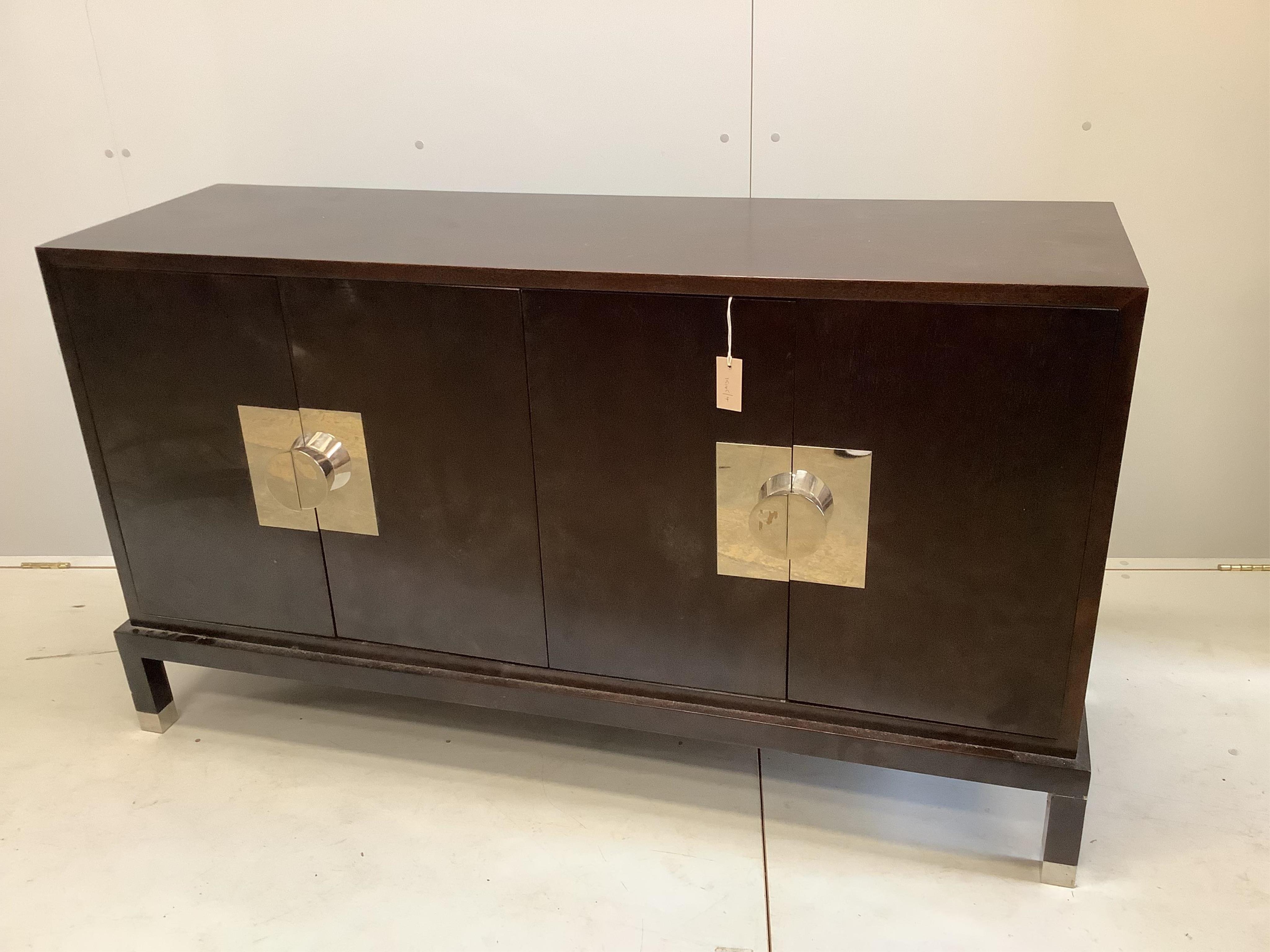 A Contemporary chrome mounted ebonised sideboard, width 150cm, depth 46cm, height 85cm. Condition - fair